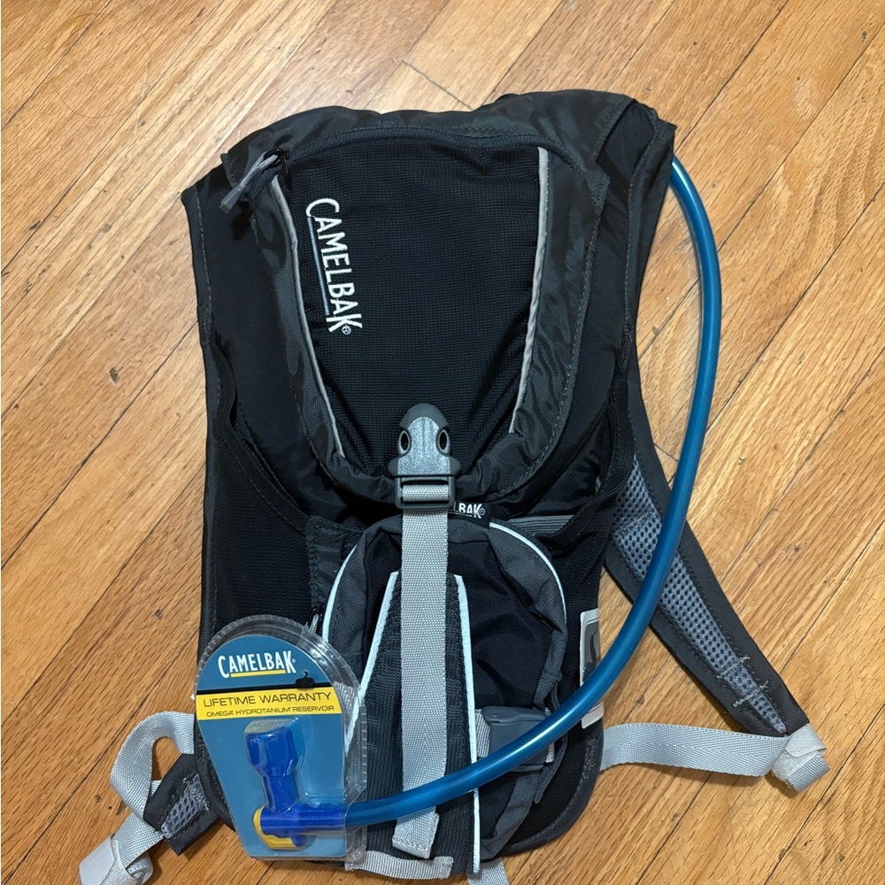 New with tags CamelBak Velocity 72oz (2L) Hydration Backpack with reservoir